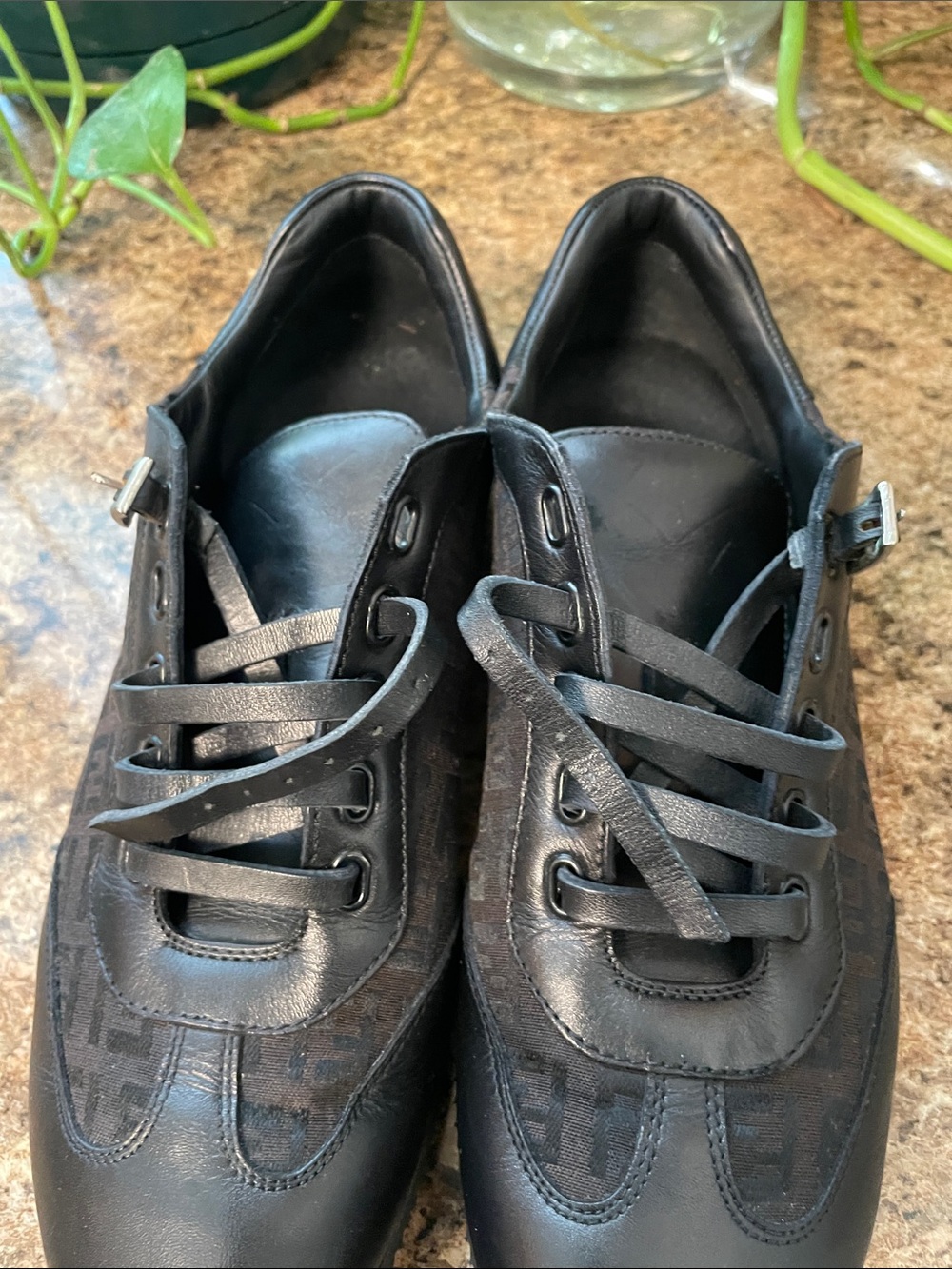 womens Fendi black leather and brown zucca canvas flats in very good condition.